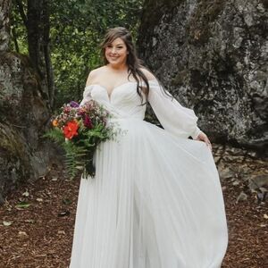 Essence Of Australia D3636 Off-Shoulder White Bridal Gown with Flowing Skirt